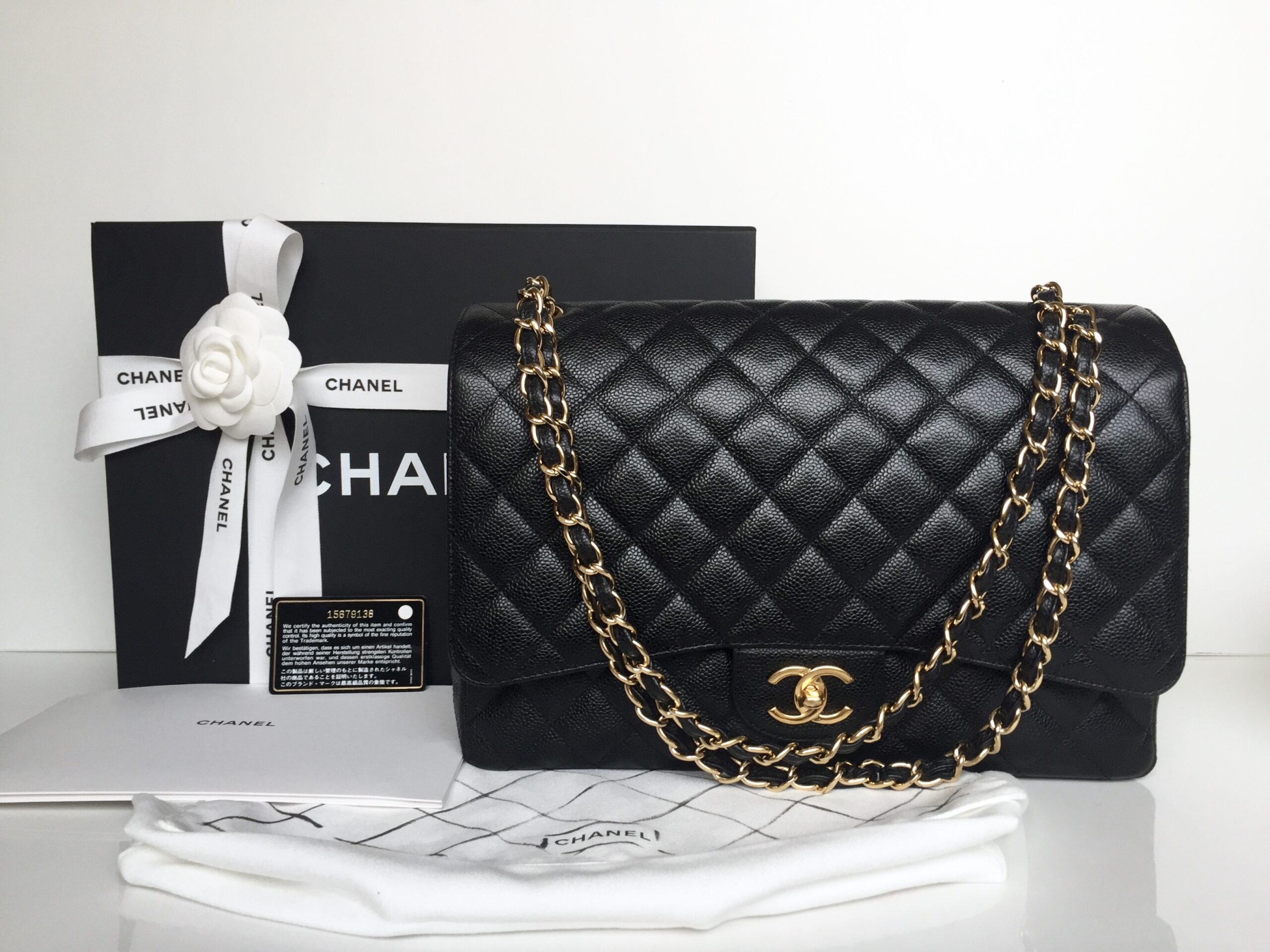 Chanel Classic Double Flap Maxi Black Caviar Gold Hardware – Coco